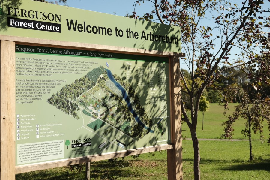 An interpretive sign welcoming visitors to the Ferguson Forest Centre arboretum in Kemptville